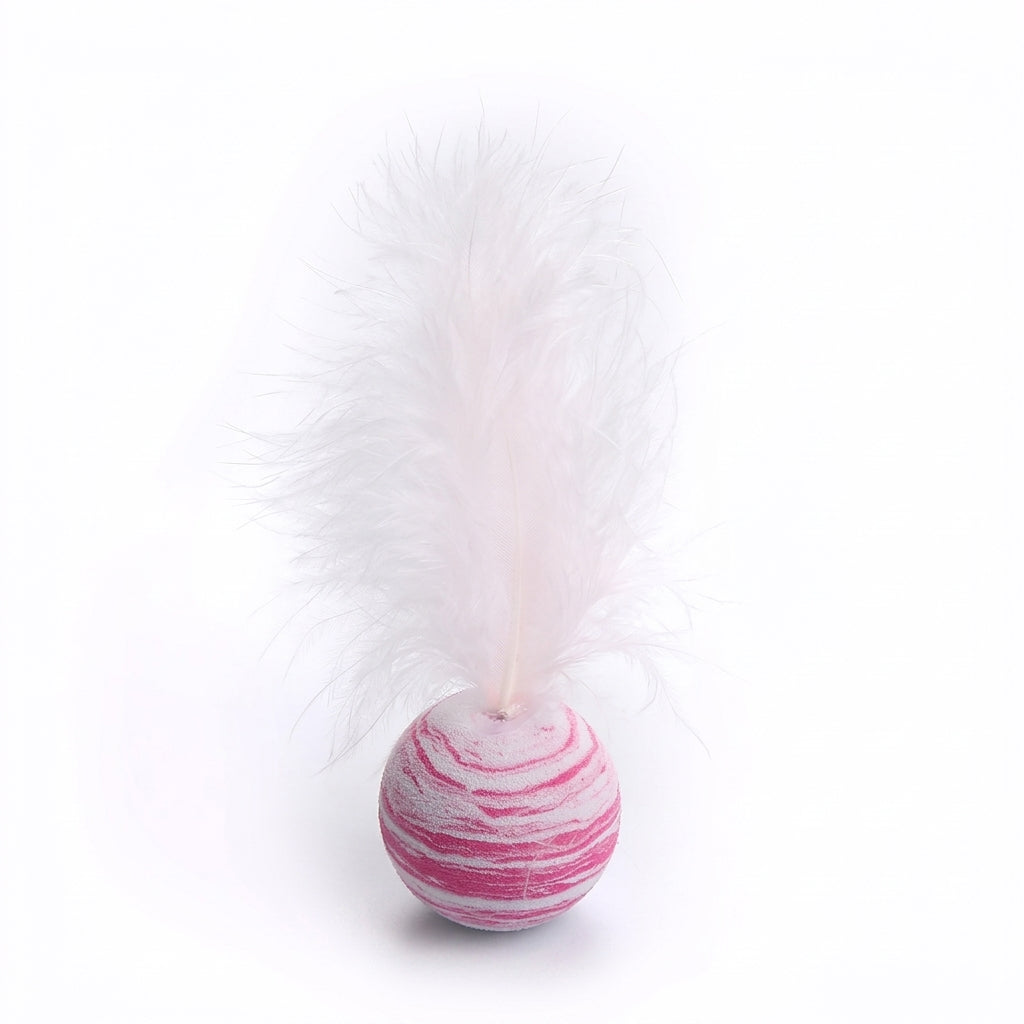 A pink and white marbled bath bomb with a fluffy white feather attached to the top, set against a plain white background.